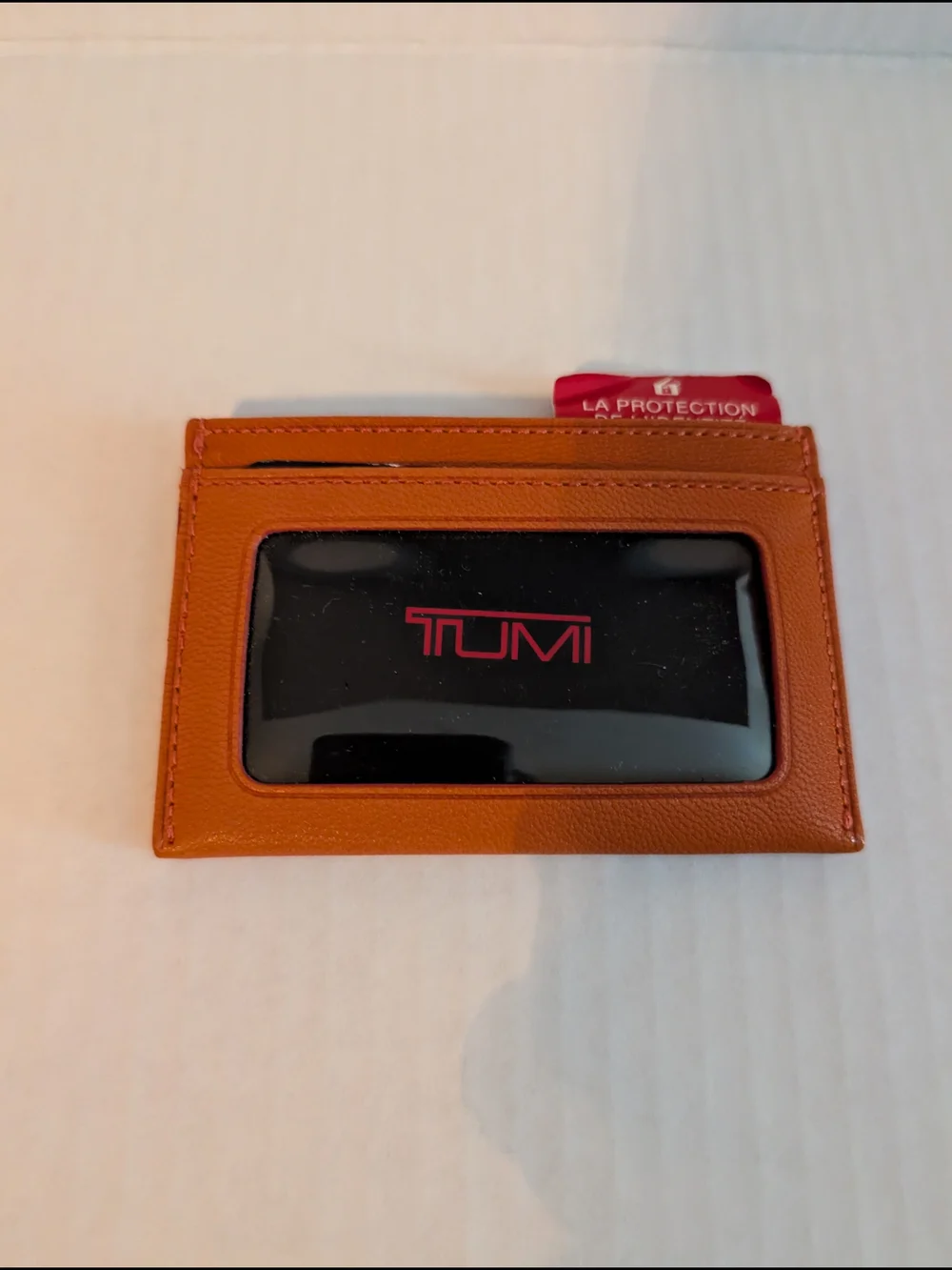 TUMI Slim Card Holder in Cognac Brown